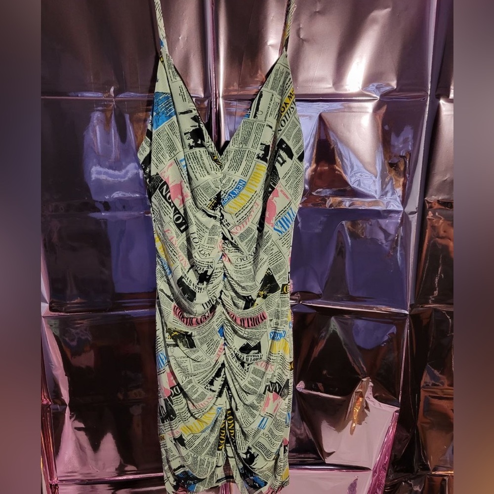 This newspaper dress will turn eyes toward you. It gives you an hourglass shape.